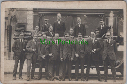 Unknown Location Postcard - Group of Men Outside J.Gibbons & Sons Premises Ref.SW9901